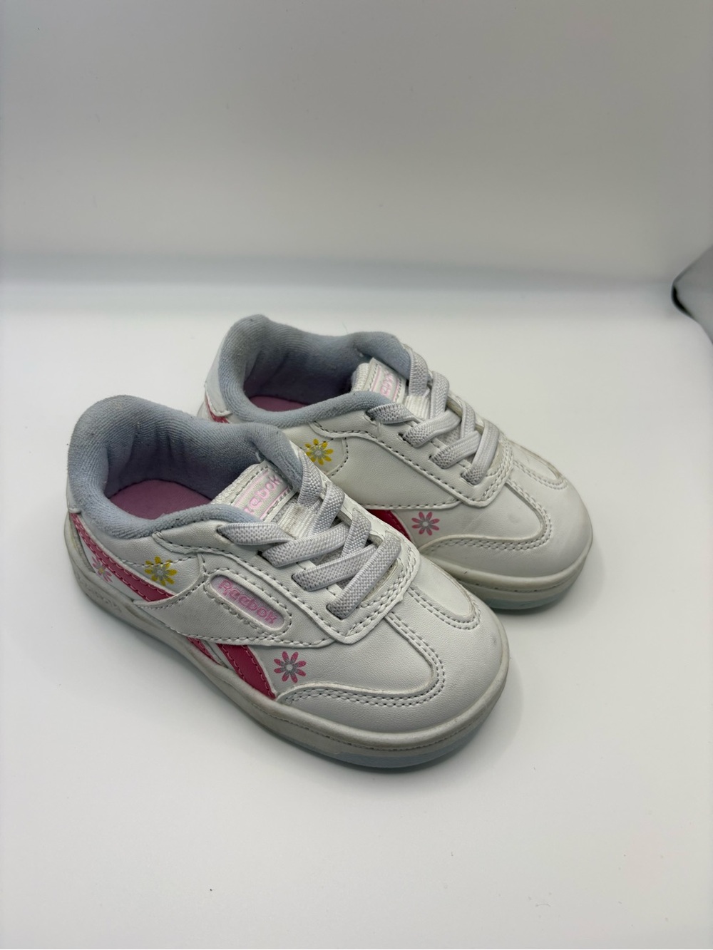 Reebok White Sneakers with Pink and Yellow Floral Accents